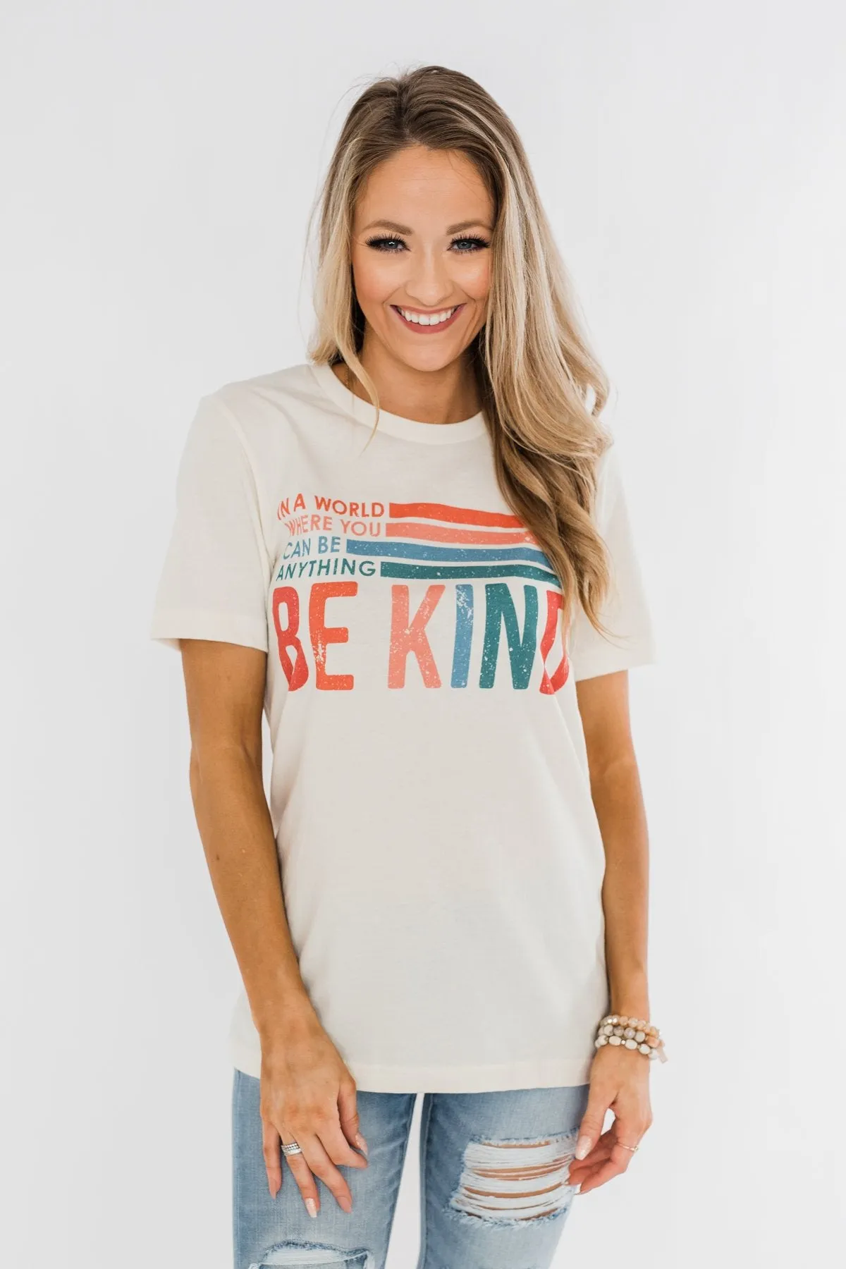 "Where You Can Be Anything, Be Kind" Colorful Graphic Tee- Cream