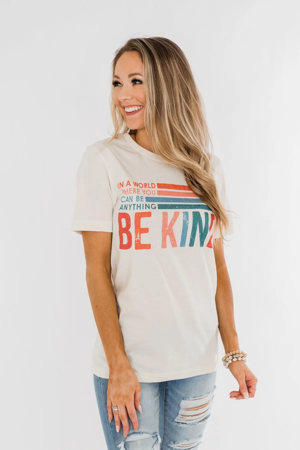 "Where You Can Be Anything, Be Kind" Colorful Graphic Tee- Cream