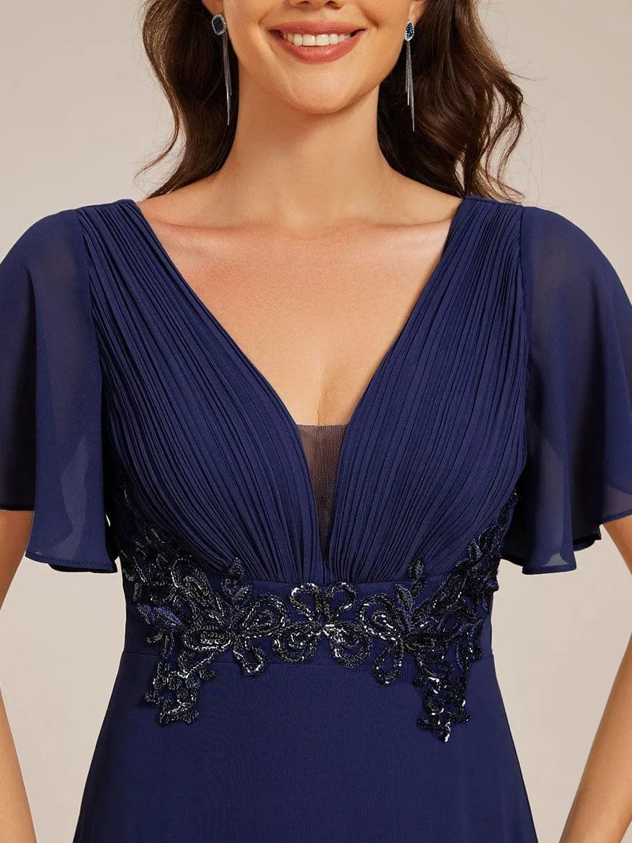 Robe de soirée longue à col en V et appliques à la taille grande taille