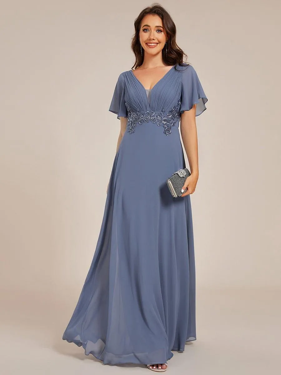 Robe de soirée longue à col en V et appliques à la taille grande taille
