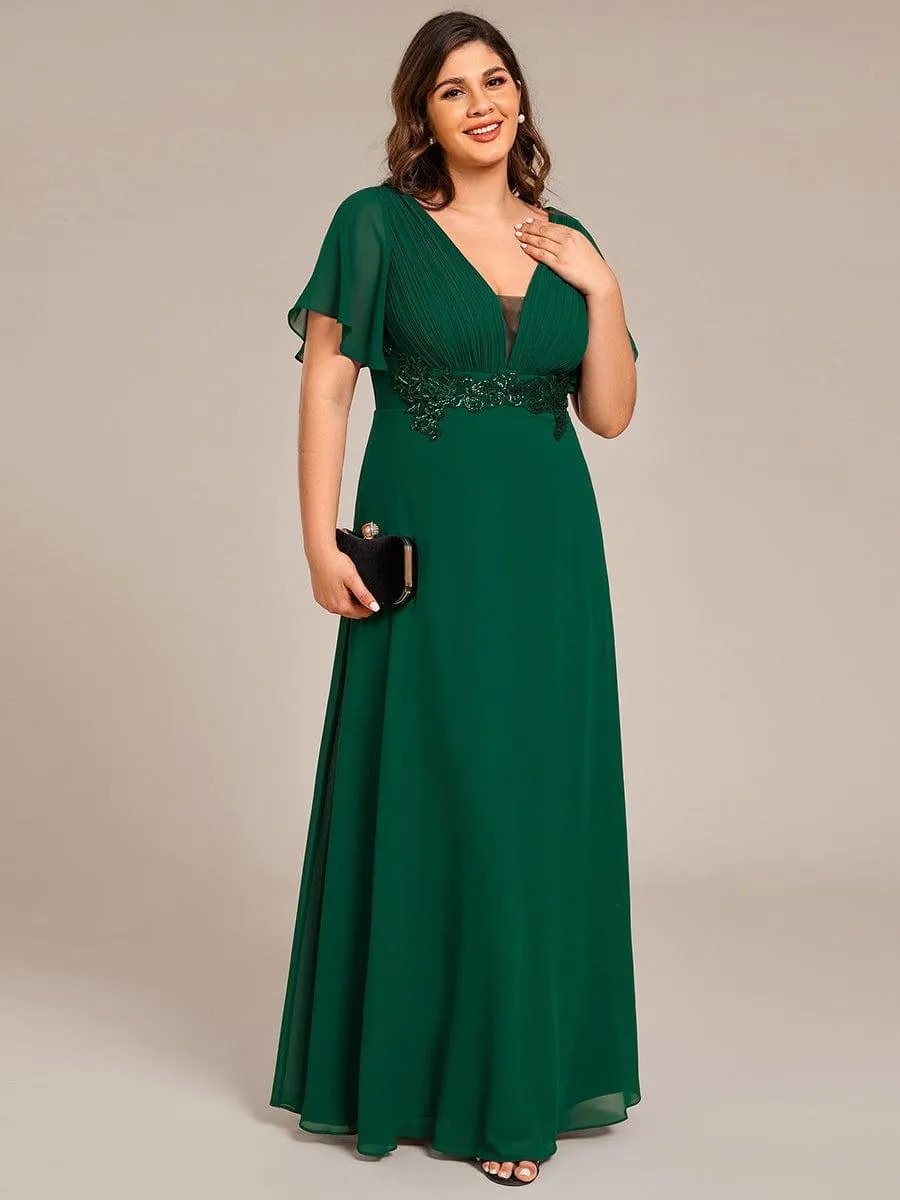 Robe de soirée longue à col en V et appliques à la taille grande taille