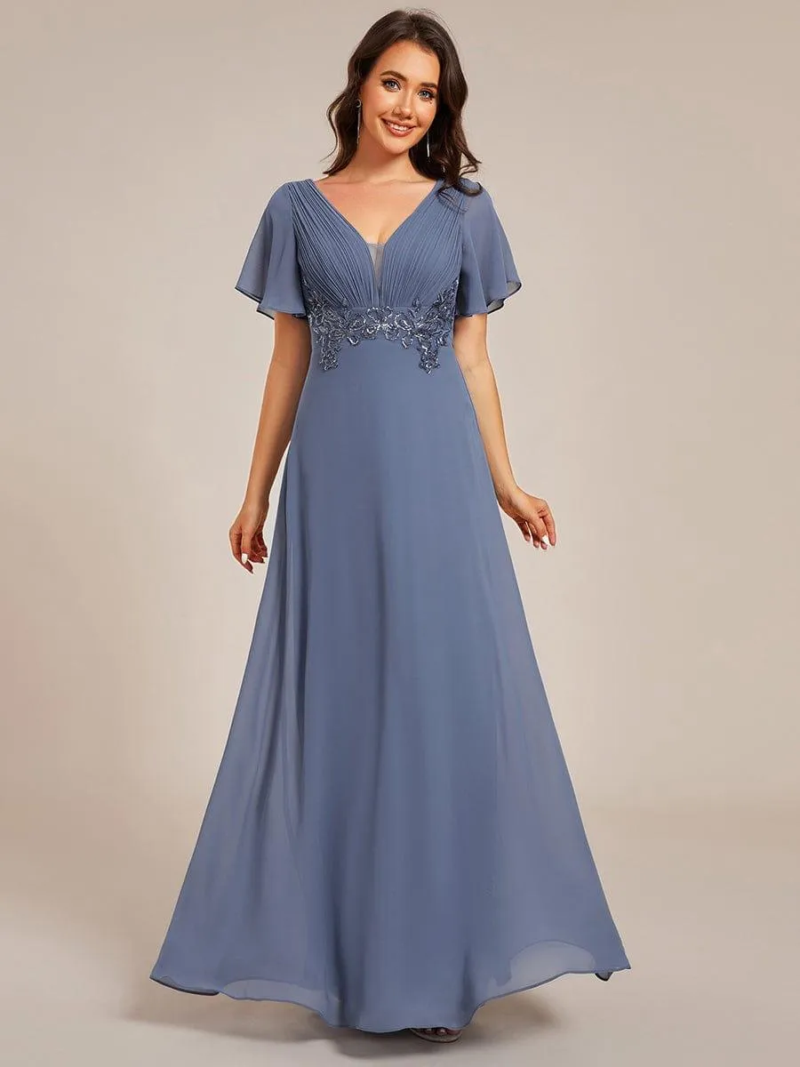 Robe de soirée longue à col en V et appliques à la taille grande taille