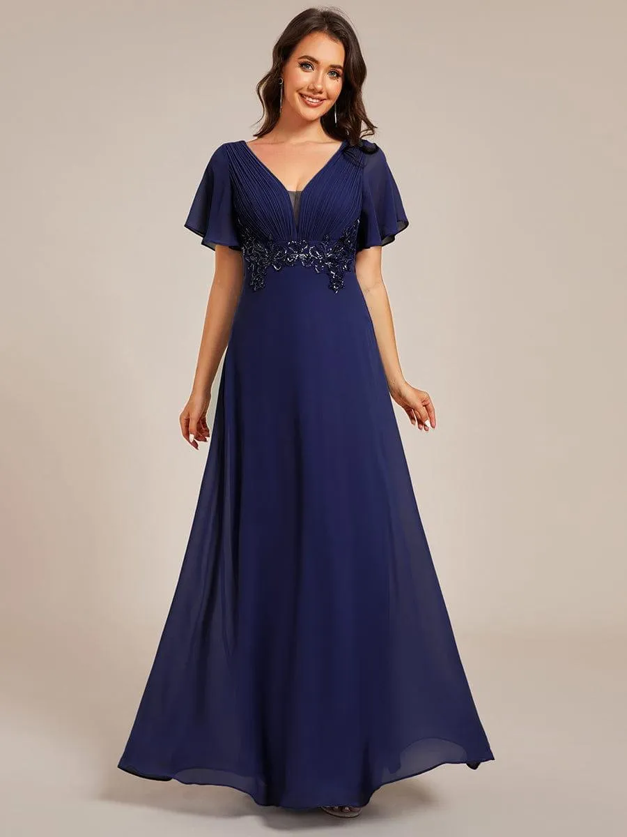Robe de soirée longue à col en V et appliques à la taille grande taille