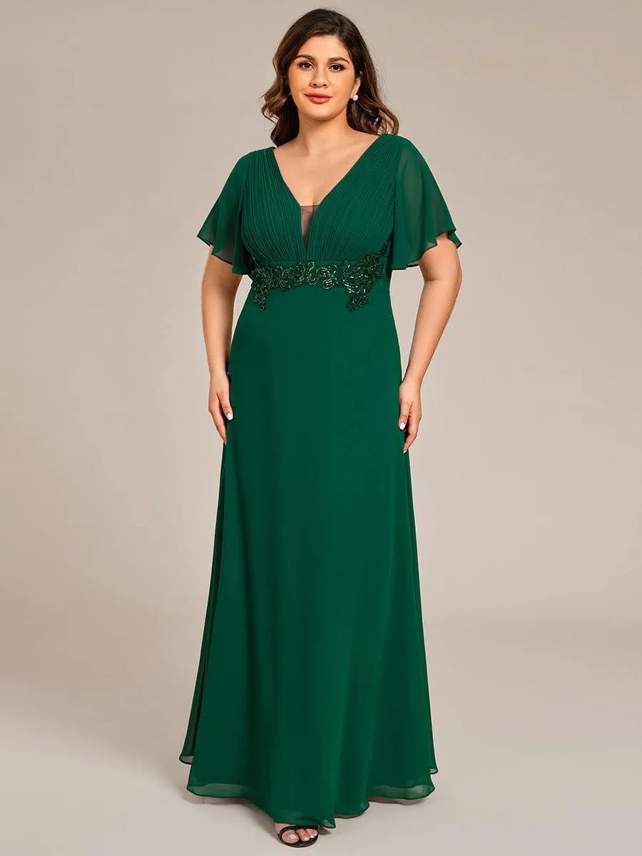 Robe de soirée longue à col en V et appliques à la taille grande taille