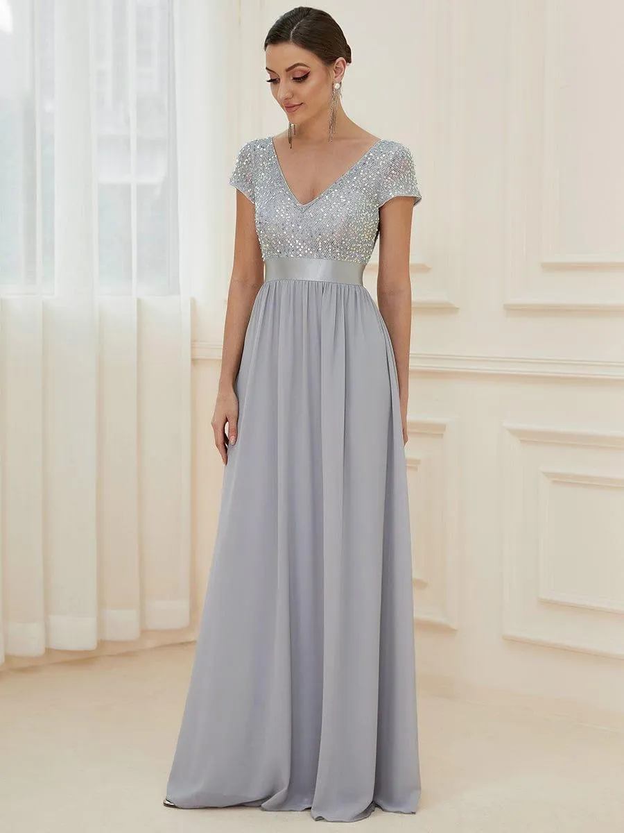 Robe de soirée taille empire à sequins et mousseline à encolure en V